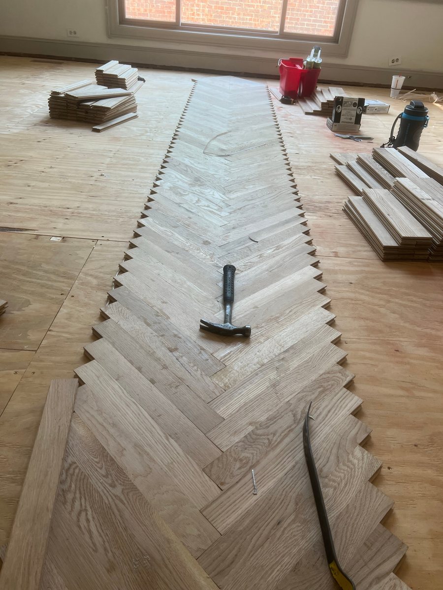 Geometric wood flooring during installation